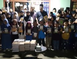 ASN Polres Lamsel Bersama Kobar, Salurkan Bantuan Al-Qur’an dan Iqro Kepada Majelis Taklim Nurul Hidayah Al Makmur