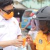 Cegah Kabut Asap Karhutla, KONI Sula Gandeng Dinkes Bagi-bagi Masker Gratis Kepada Siswa dan Masyarakat